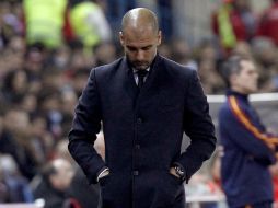 Josep Guardiola ve muy complicado alcanzar al Real Madrid en la Liga de España. AFP  /