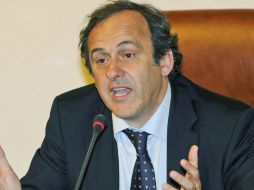 El jefe del fútbol europeo, Michel Platini sigue optimista y confia en que se encuentren soluciones . ARCHIVO  /