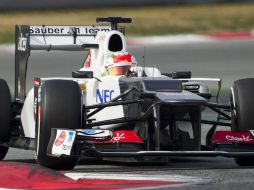 Sergio Pérez superó a algunos pilotos marcados como favoritos para competir por el título de la Fórmula Uno. EFE  /