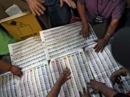 Si la tendencia sigue, de los 84 escaños de la Asamblea Legislativa, ARENA obtendría 33 plazas. AFP  /