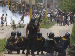 Durante el enfrentamiento nueve policías fueron lesionados. EFE  /