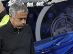 Mourinho sopla luego del empate del Málaga en el Bernabéu. EFE  /