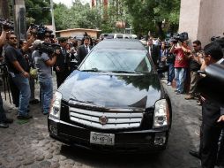 La carroza fúnebre con los restos mortales del ex presidente. EFE  /