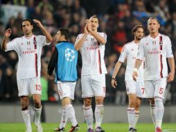 Milán empató en la liga contra el Catania y fue eliminado de la Champions por el Barcelona. AFP  /