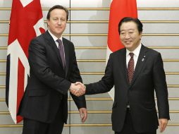 El primer ministro británico, David Cameron, y su homólogo japonés, Yoshihiko Noda se reúnen en Tokio. AFP  /