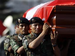 Funeral de uno de los policías caídos en la operación, Lander Tamani. AP  /