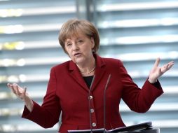 Angela Merkel destacó que, en años anteriores, Alemania occidental apenas tenía deudas. AFP  /