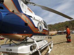 El helicóptero estatal Fénix y unas cinco aeronáves militares apoyan en el combate contra el sinistro. ARCHIVO  /