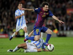 Lionel Messi anota tres goles en el triunfo del Barcelona 4-1 ante el Málaga. AFP  /