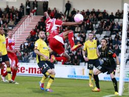 Acción de uno de los goles del Ajaccio durante el partido ante el Sochaux. AFP  /