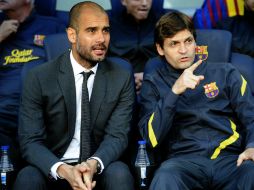 Guardiola (i) junto a Vilanova, su próximo sustituto, en el pasado juego de los azulgranas ante Málaga. AP  /