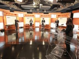 Los candidatos presidenciales participan en el primer debate televisado desde el WTC. REUTERS  /