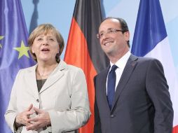 Tanto Angela Merkel como el presidente de Francia, Hollande enfatizaron que quieren mantener a Grecia en la zona euro. EFE  /