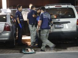 Personal forense acudieron al lugar del homicidio.  /