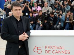 Cristian Mungiu posa para los fotógrafos durante el 65º Festival de Cine de Cannes. AFP  /