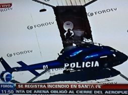 Imágenes de la televisión mostraron el rescate de algunas personas que estaban en la azotea. ESPECIAL  /