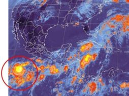 Imagen satelital de ''Bud'' que muestra la ubicación del meteoro 715 kilómetros al sur-suroeste de Manzanillo. ESPECIAL  /