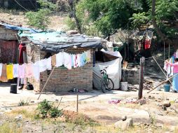 Los números rojos en materia de pobreza y una desigualdad que crece a pasos acelerados en Jalisco. ARCHIVO  /