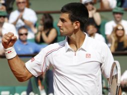 Djokovic celebra tras ganar el enfrentamiento con el esloveno Potito Starace. REUTERS  /