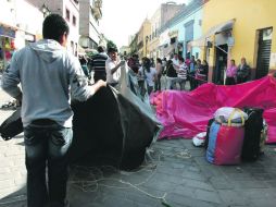 ocentes de la CNTE levantan sus casas de campaña del Centro oaxaqueño una vez terminada la movilización. NTX  /