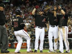 Miguel Montero pegó grand slam y llevó a los Atléticos de Oakland al triunfo contra los Diamondbacks de Arizona. AFP  /