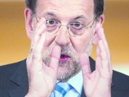 El jefe del Gobierno, Mariano Rajoy,  dijo que su gestión salvó de la intervención al Reino de España. AP  /