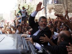 El brazo político de los Hermanos Musulmanes declaró  que su candidato, Mohamed Mursi, ganó las primeras elecciones populares. REUTERS  /
