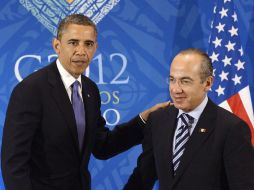 Los presidentes de México y Estados Unidos, Felipe Calderón y Barack Obama se reúnen en privado. AFP  /