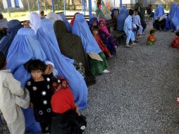 La policía reportó que entre los rehenes se incluyen mujeres y niños. EFE  /