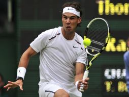 El español sumó su victoria número 50 en torneos sobre hierba. AFP  /