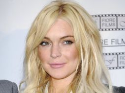 Nuevamente, Lindsay Lohan posa con una pistola. ARCHIVO  /