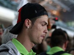 La estrella portuguesa fue recibida por cientos de personas en el aeropuerto de Portela. REUTERS  /