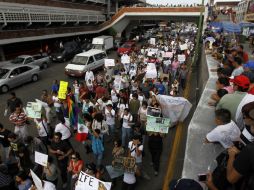 Cuando el contingente pasó por San Juan de Dios, gritaban ''hay que votar, hay que votar, si no votamos la chingada va a llegar''.  /