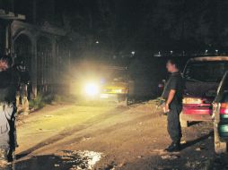 Las autoridades tonaltecas acudieron al lugar del homicidio. ESPECIAL  /