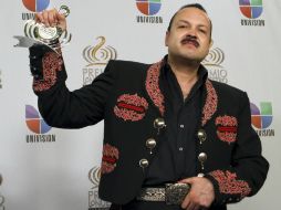 El cantante recibió recientemente el Premio a la Excelencia en la pasada entrega de los premios Billboard. AP  /