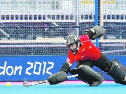 A entrenar. Ajenas al debate, las jugadoras de hockey de Nueva Zelanda ya realizan entrenamientos. AP  /