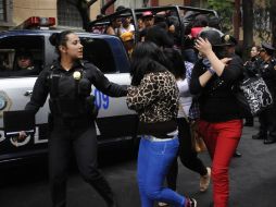 El fin de semana pasado se aprehendió a más de 200 jóvenes por supuestamente crear disturbios. ARCHIVO  /