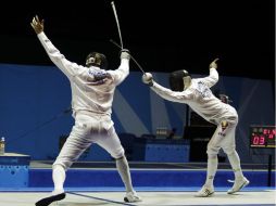 Rubén Limardo (der), de Venezuela, es el más sólido latinoamericano en la lucha por el podio olímpico en esgrima. ARCHIVO  /