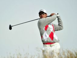 Adam Scott tira en la tercera ronda del día. AFP  /