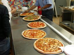 Indicaron que ya no será necesario levantarse del sofá para comprar pizza o encargarla por el teléfono. ARCHIVO  /