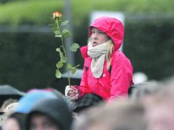 EL CIERRE. Un concierto, que escucha la niña de la imagen, terminó con los actos conmemorativos. REUTERS  /