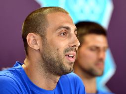 Miroslav Cavic piensa que ninguna compañía inmiscuida en los Olímpicos, debe tener intereses creados en un atleta. AFP  /