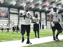Mirada seria. Al fondo del edificio se aprecia la manta de Sean Payton, coach de Nueva Orleans. AP  /