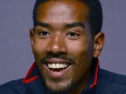 ''Entre clasificaciones y finales escucho música country'', declaró el campeón de triple salto Christian Taylor. AFP  /