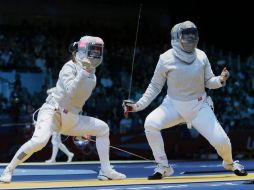 La mexicana (derecha) no pudo contestar a la mayor rapidez de su rival. AP  /