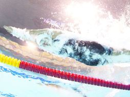 Liliana Ibáñez durante la prueba clasificatoria de los 100 metros libres femenil, en donde quedó en el lugar 25. AP  /