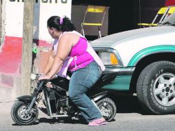 El sobrepeso obliga a industriales del vestido, del mueble y de las empresas vehiculares a analizar las dimensiones de sus productos.  /