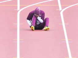 La catarí Noor Hussain Al-Malki se lesionó durante la ronda preliminar de los 100 metros planos femenil.  /