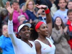 Venus y Serena cerraron el partido en una hora y 33 minutos. AFP  /