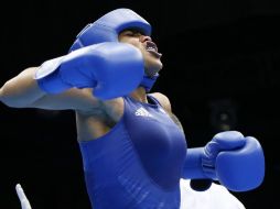 No podría hacer otra cosa que pasarle por arriba con un autobús, dijo la boxeadora Natasha Jones después de perder. AFP  /